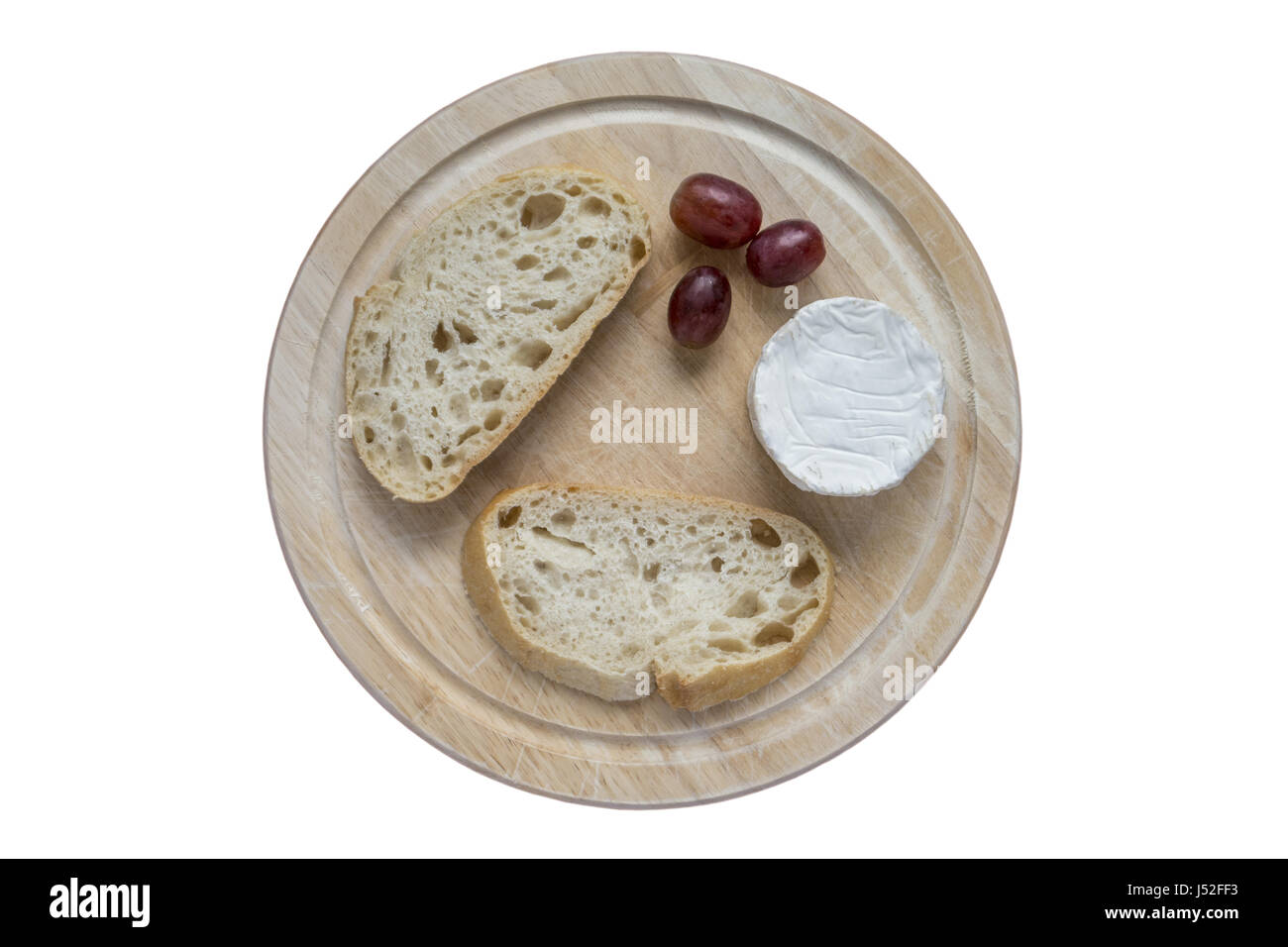 Sourdough and Goats Cheese on a bread board Stock Photo Alamy