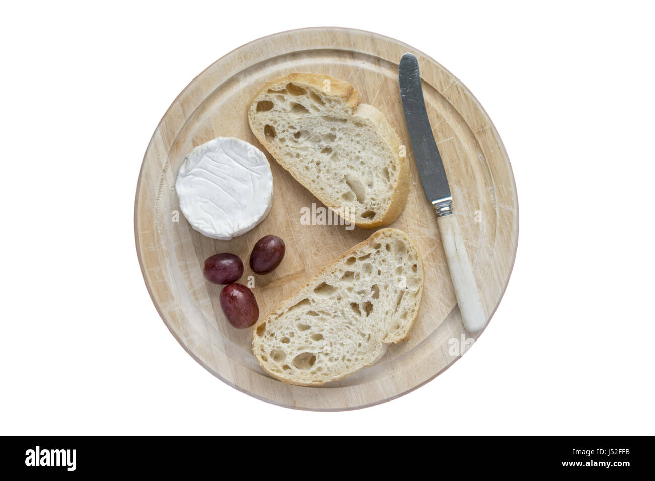 Sourdough and Goats Cheese on a bread board Stock Photo Alamy