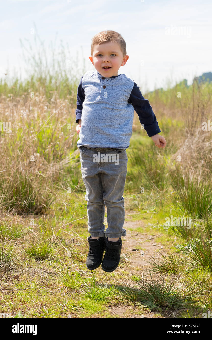 Lifestyle Portrait Young Boy Outdoors Stock Photo