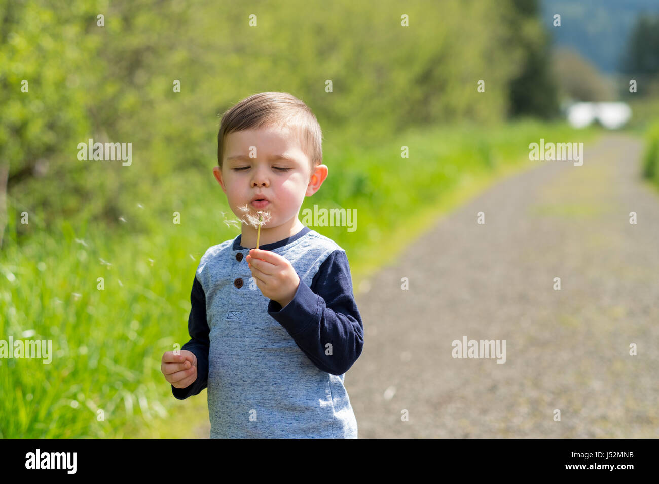Lifestyle Portrait Young Boy Outdoors Stock Photo - Alamy