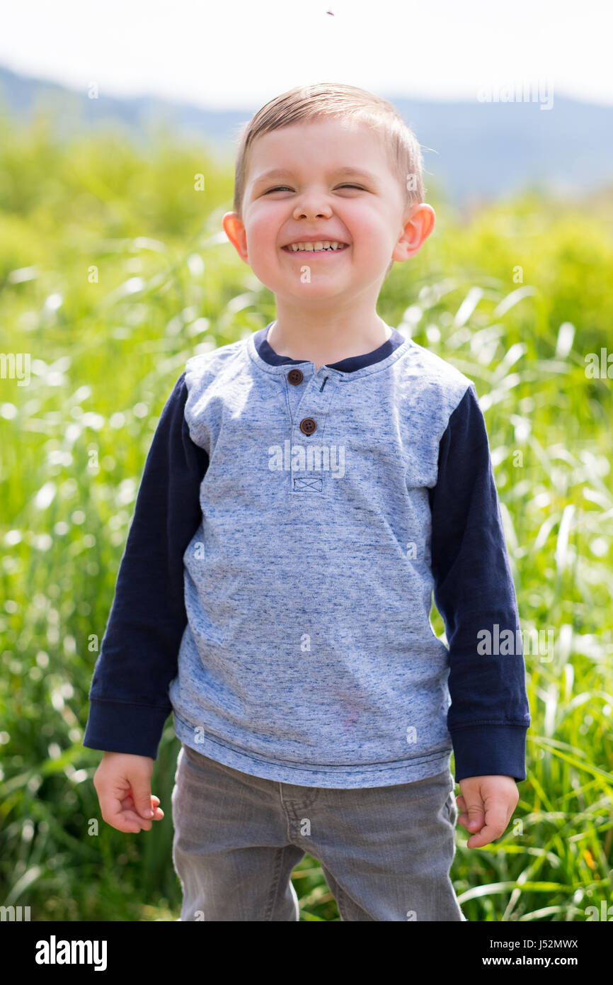 Lifestyle Portrait Young Boy Outdoors Stock Photo