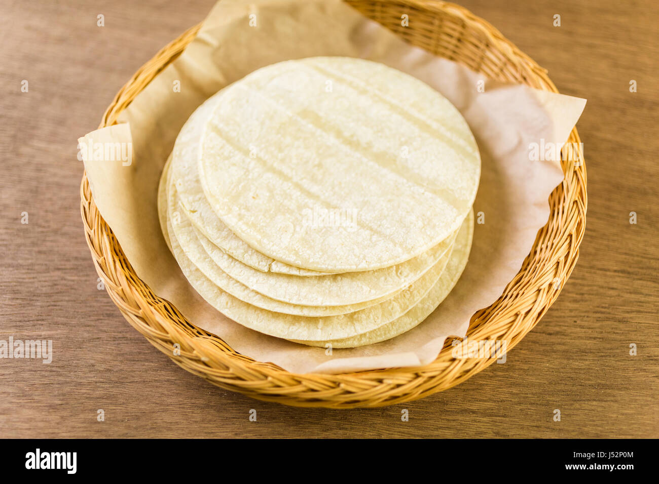 Fresh white corn tortillas on a wood background Stock Photo Alamy