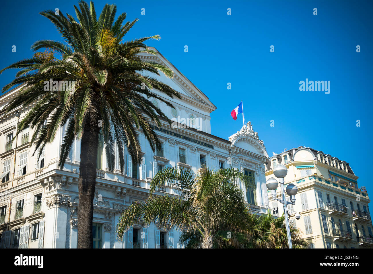 Nice opera house and palm trees on French Riviera Stock Photo