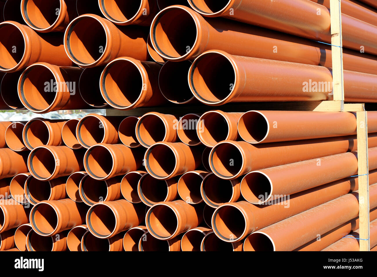 pallet of sewer pipes Stock Photo