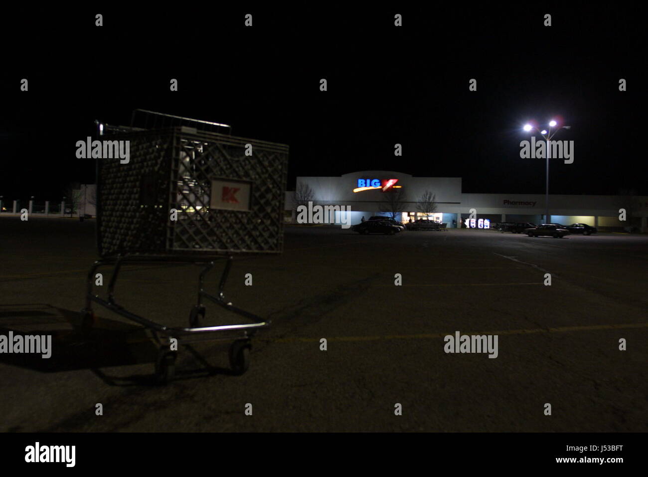Empty shopping carts sits uncollected at a Big K ( K Mart ) discount