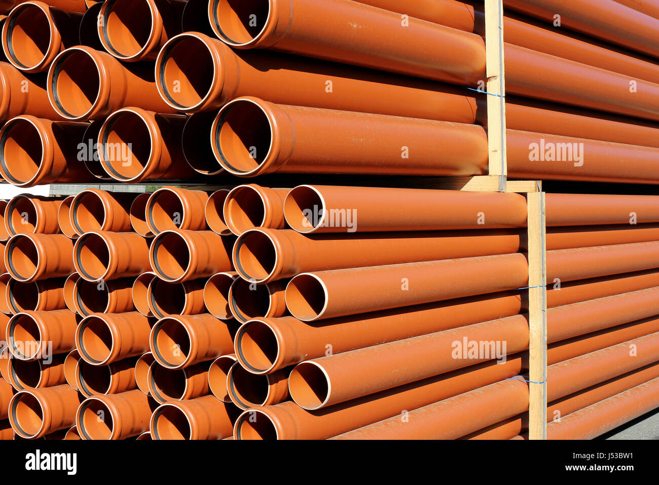 pallet of sewer pipes Stock Photo
