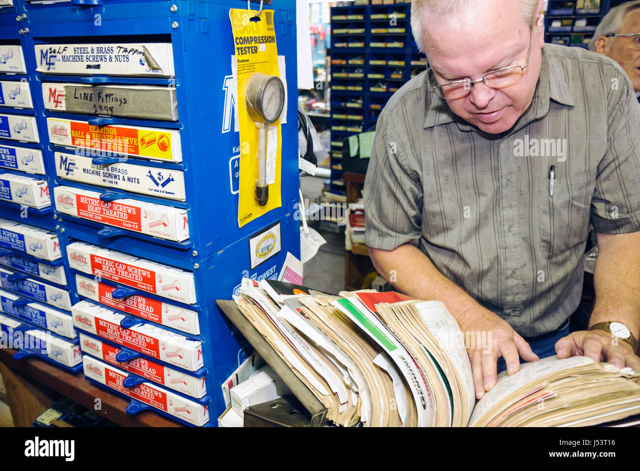 Arkansas Randolph County,Pocahontas,Western Auto,hardware,tractor parts,automobile parts,man men male,middle aged,store,stores,businesses,district,sho Stock Photo