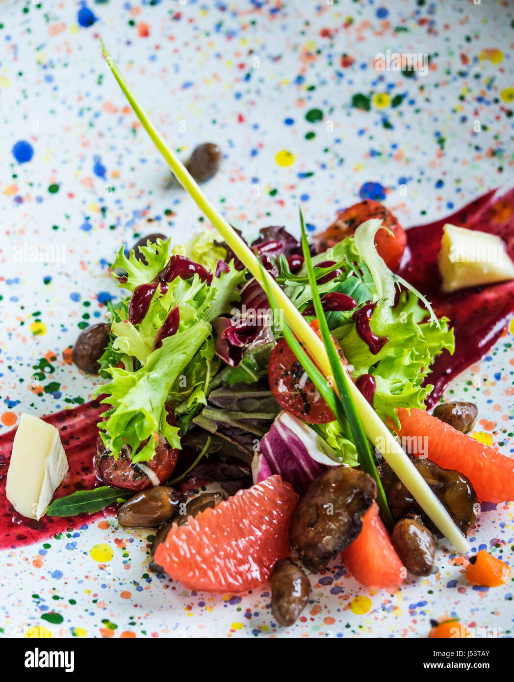 Salad with quail liver and grapefruit. Selective focus Stock Photo Alamy