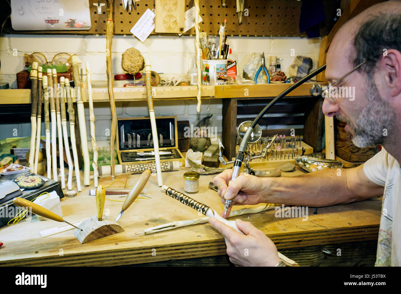 Arkansas Ozark Mountains,Hardy,Main Street,Ozark Classic Crafts Mall,magic stick,man men male,craftsman,artisan,carving,woodwork,tools,worktable,art,a Stock Photo