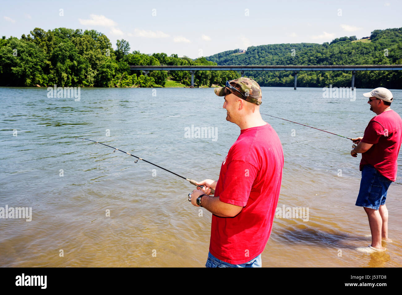 Arkansas Ozark Mountains,Allison,White River,man men male,freshwater fishing,angler,shore,rod,reel,recreation,sport,AR080603034 Stock Photo