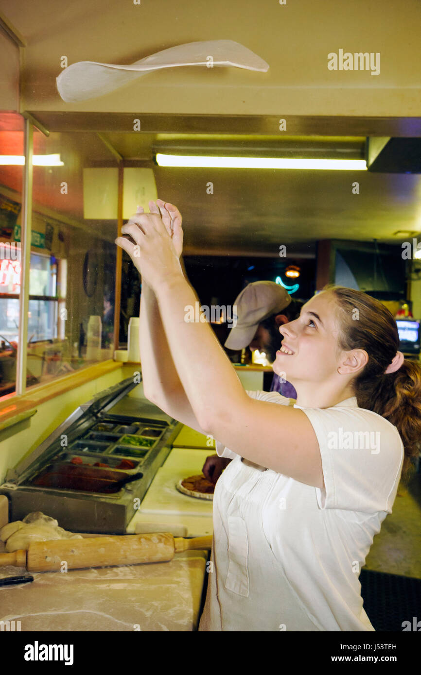 Arkansas Ozark Mountains,Stone County,Mountain View,Tommy's Famous Pizza BBQ & Ribs,woman female women,chef,cook,pizza,throwing,pizzeria,dough,working Stock Photo