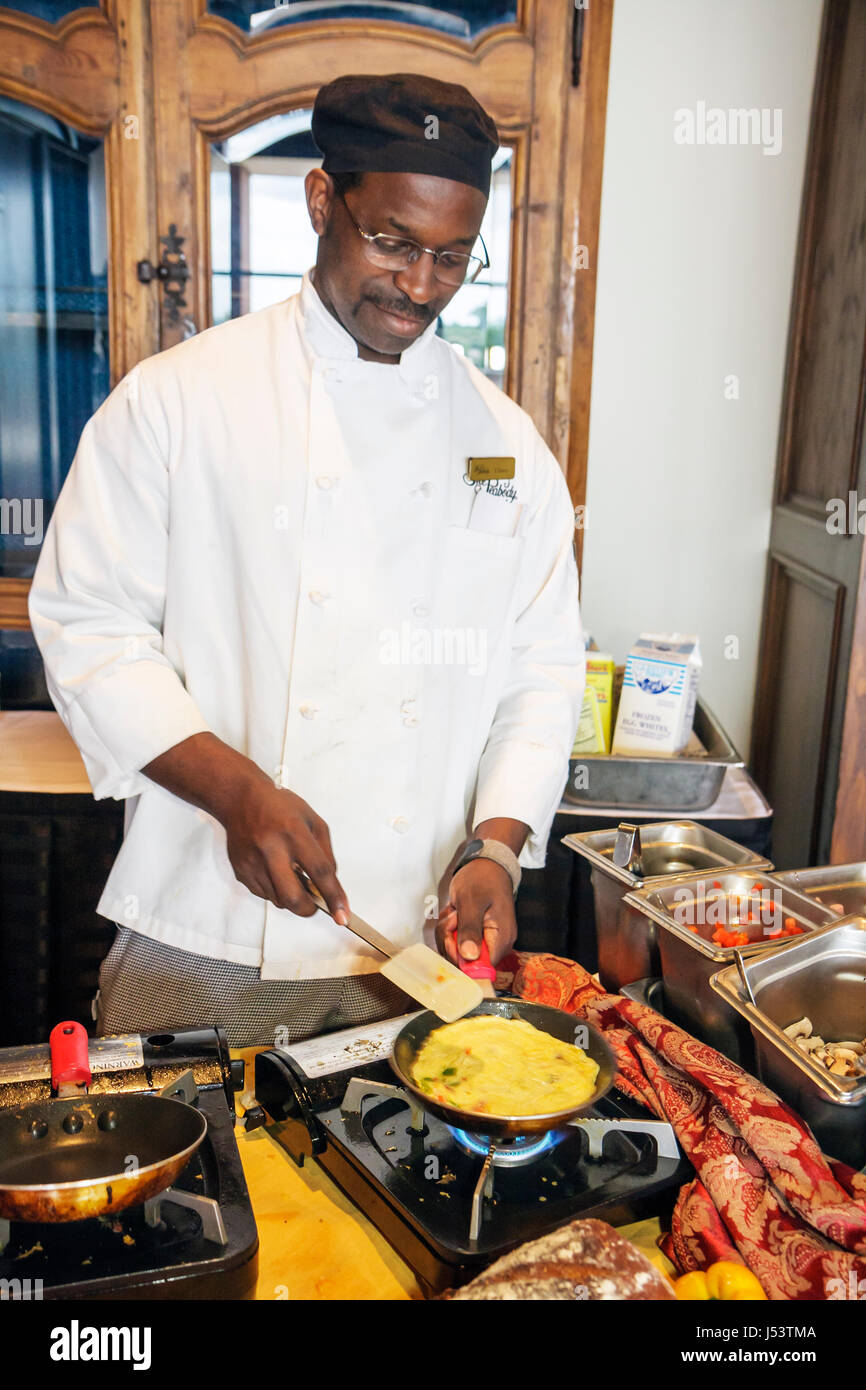 Little Rock Arkansas,The Peabody Little Rock,hotel,Black man men male,cook,omelet station,food,breakfast,eggs,food preparation,working,work,employee w Stock Photo