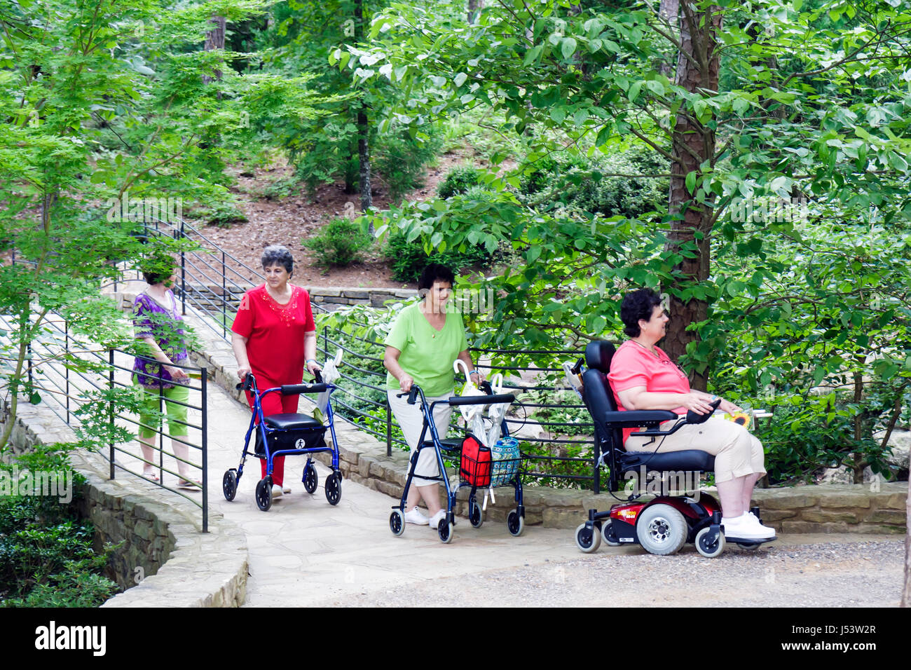 Arkansas Hot Springs,Garvan Woodland Gardens,woman female women,group,disabled,physically impaired,accessible,electric wheelchair,independent,mobility Stock Photo