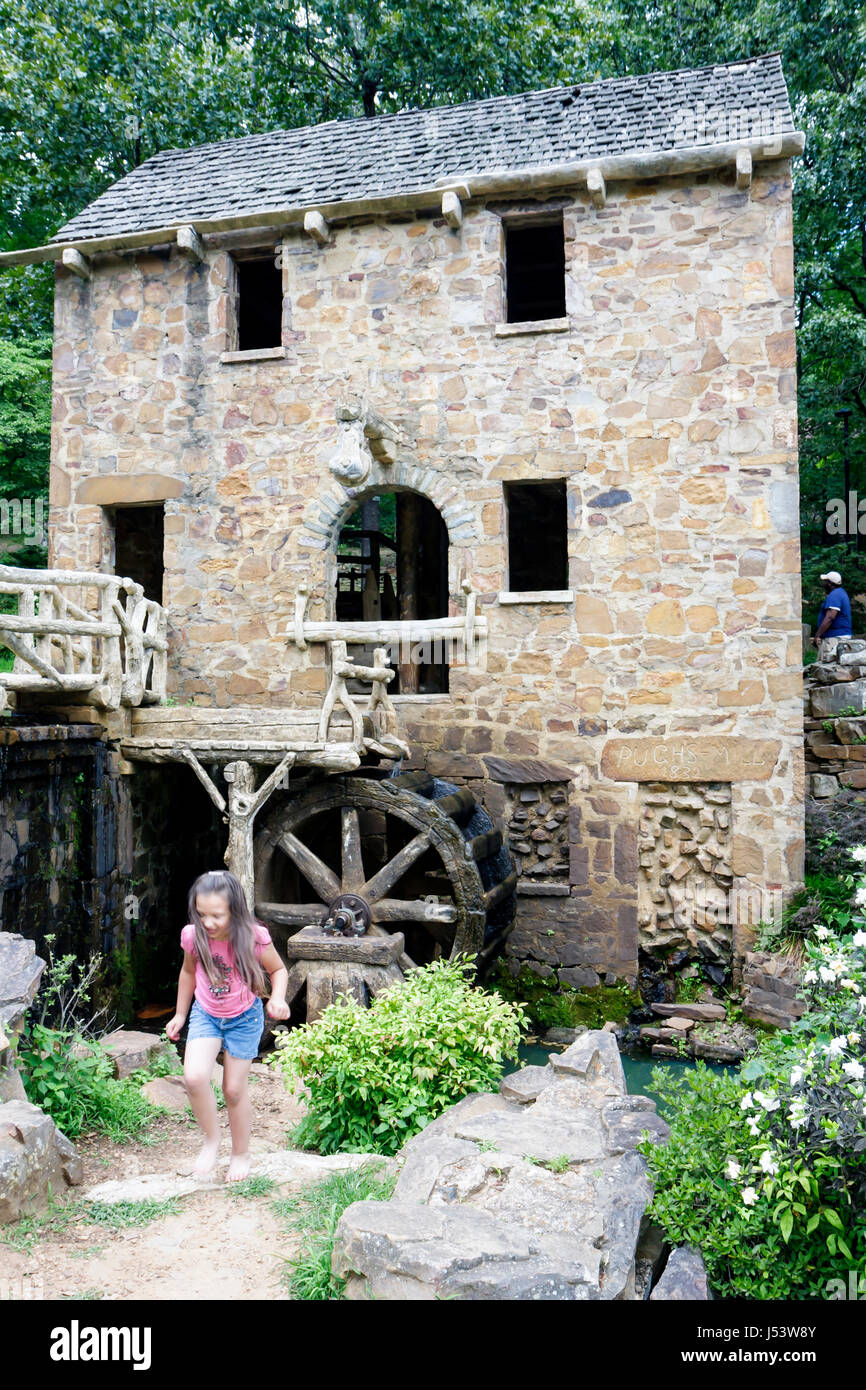 Little Rock Arkansas,T.R. Pugh Memorial Park,The Old Mill,appeared in Gone With The Wind,girl girls,youngster youngsters youth youths female kid kids Stock Photo
