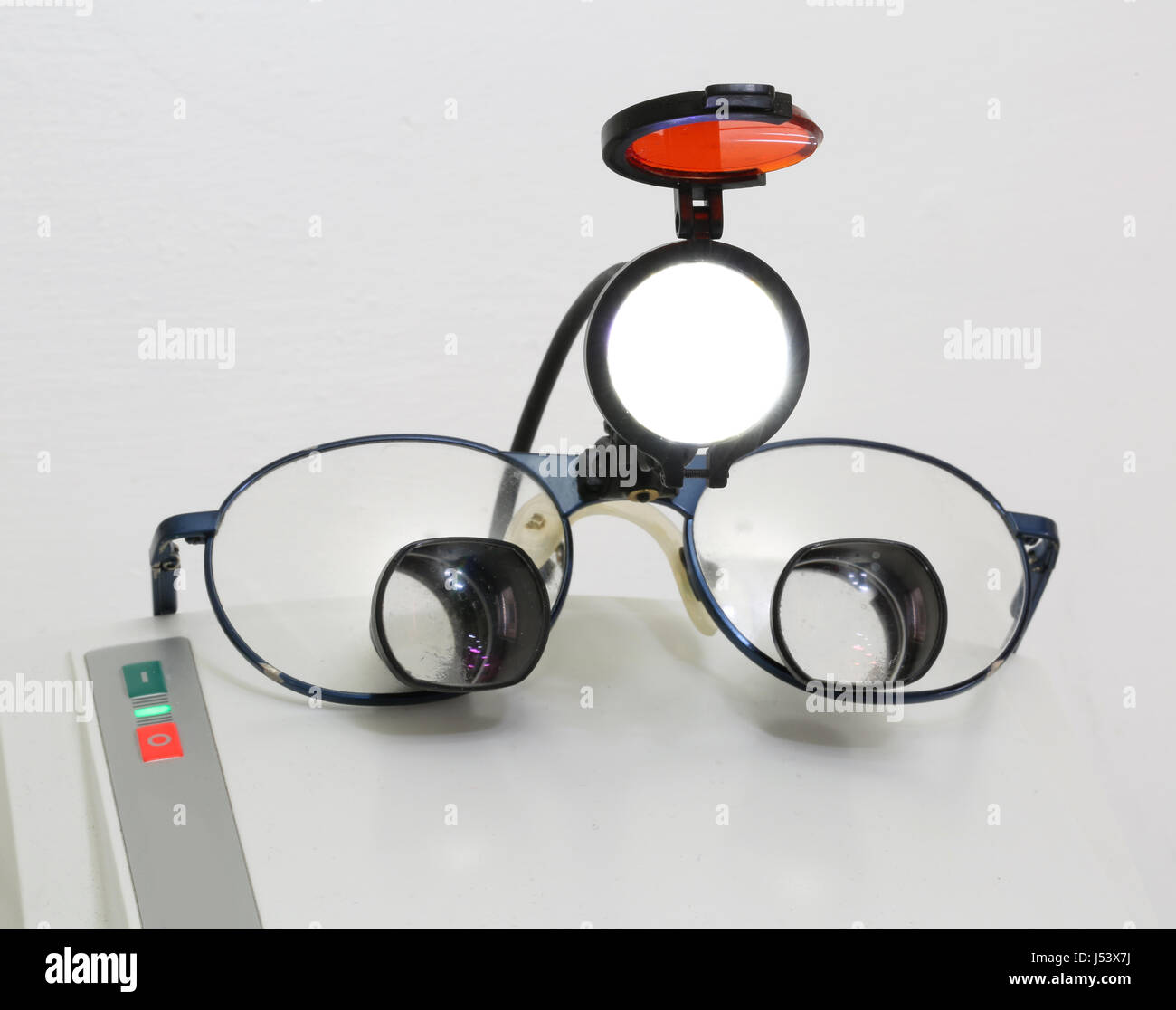 modern glasses with four big lenses and an infrared spotlight light for
