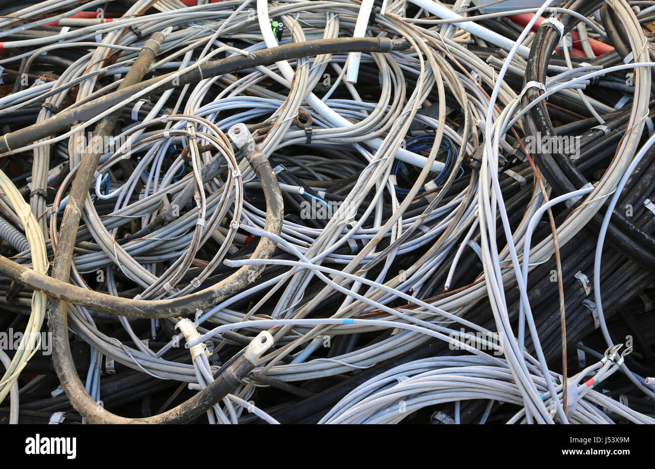 pile of used electrical cables in the landfill for recyclable materials