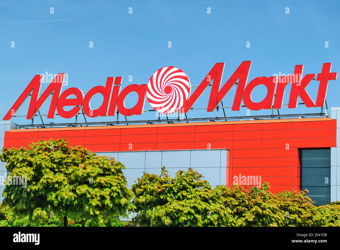 Nowy Sacz, Poland - 15 May 2017: Sign of a Media Markt store on the blue sky. Mediamarkt is a German chain of stores selling consumer electronics with Stock Photo