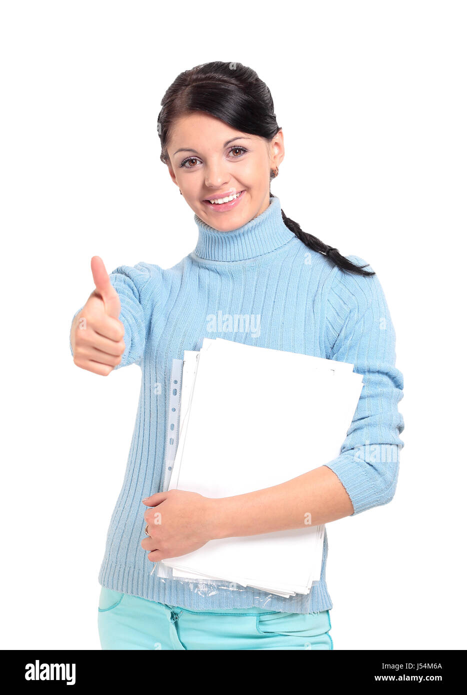 Attractive young woman  gives thumbs up to camera Stock Photo