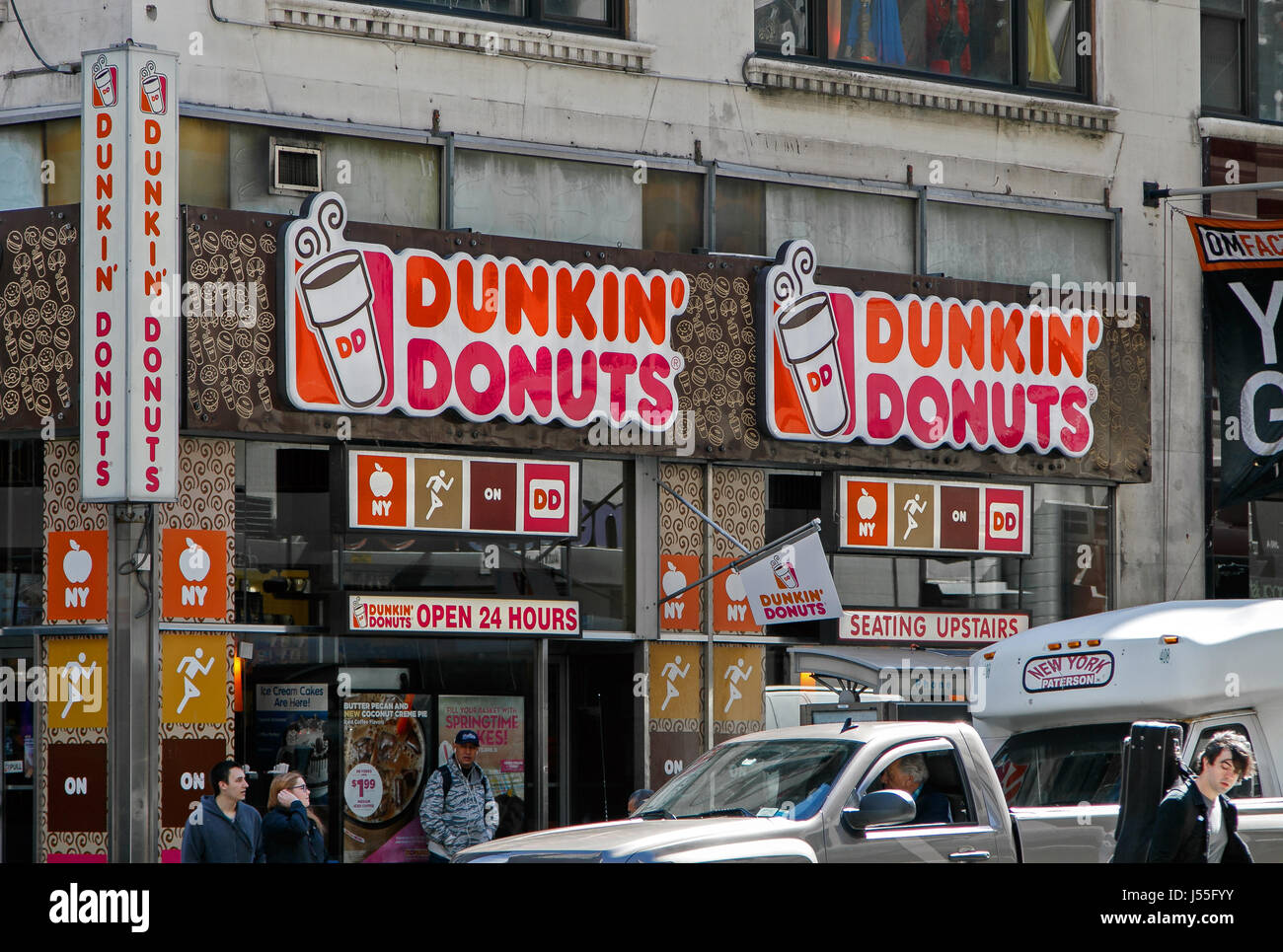 New York, May 08, 2017: Exterior signs on one of Dunkin Donuts locations in Manhattan. Stock Photo