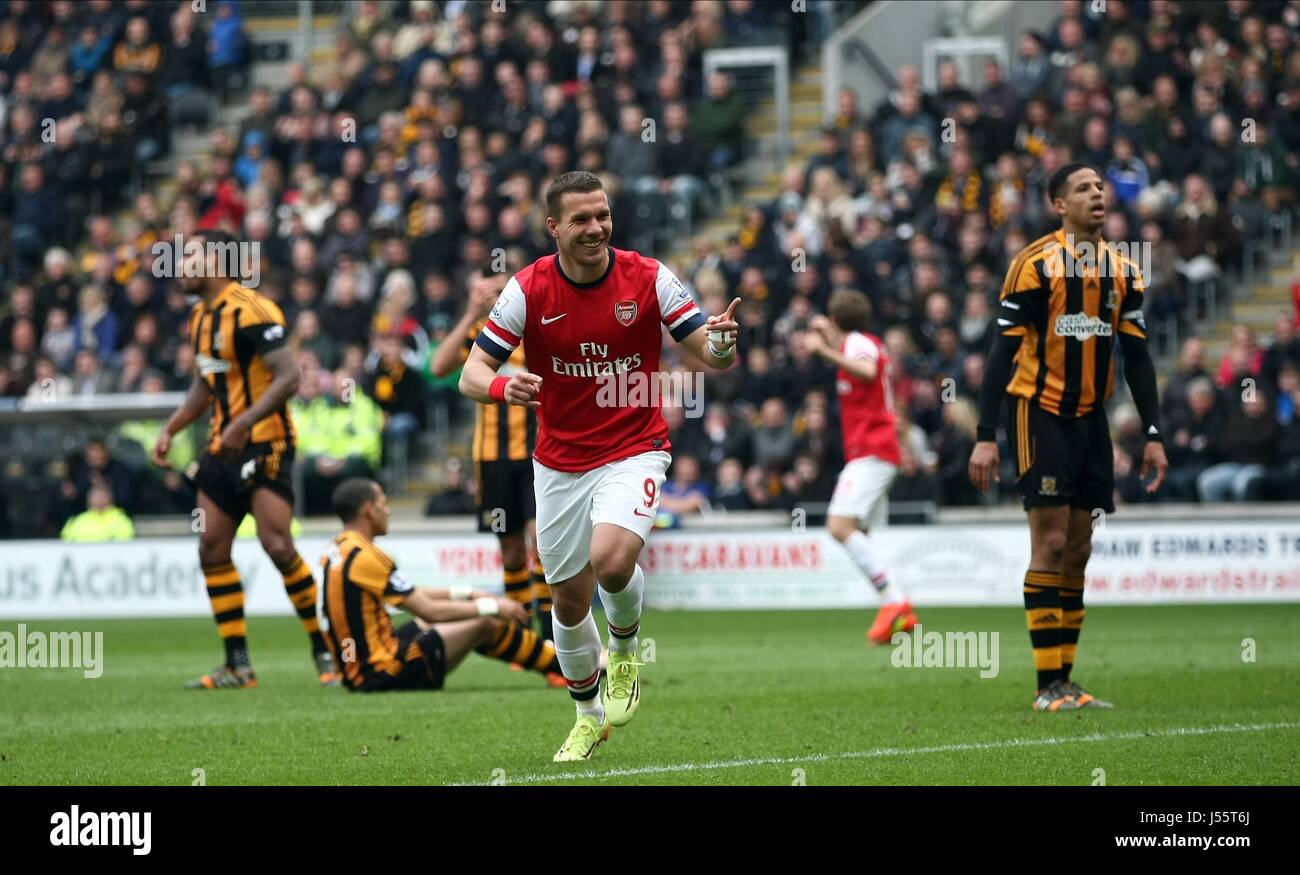 LUKAS PODOLSKI CELEBRATES MAKI HULL CITY V ARSENAL KC STADIUM HULL ENGLAND 20 April 2014 Stock Photo