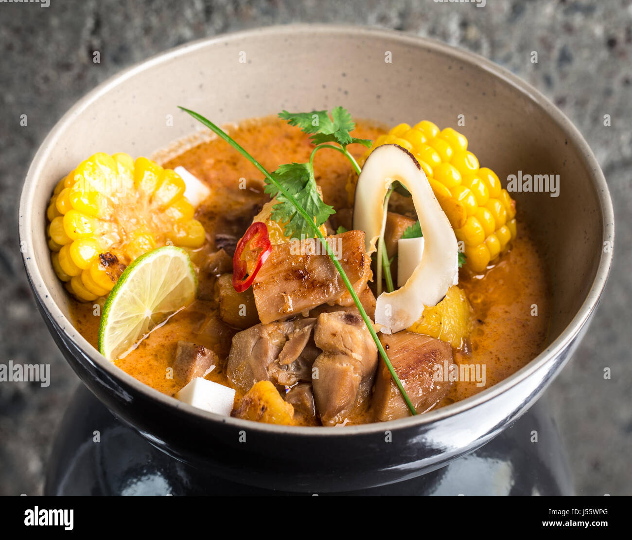 Curry chicken in a bowl Stock Photo