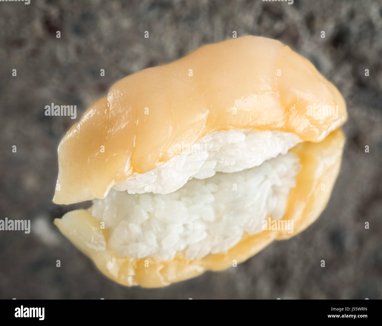 Nigiri sushi with marinated scallop Stock Photo Alamy