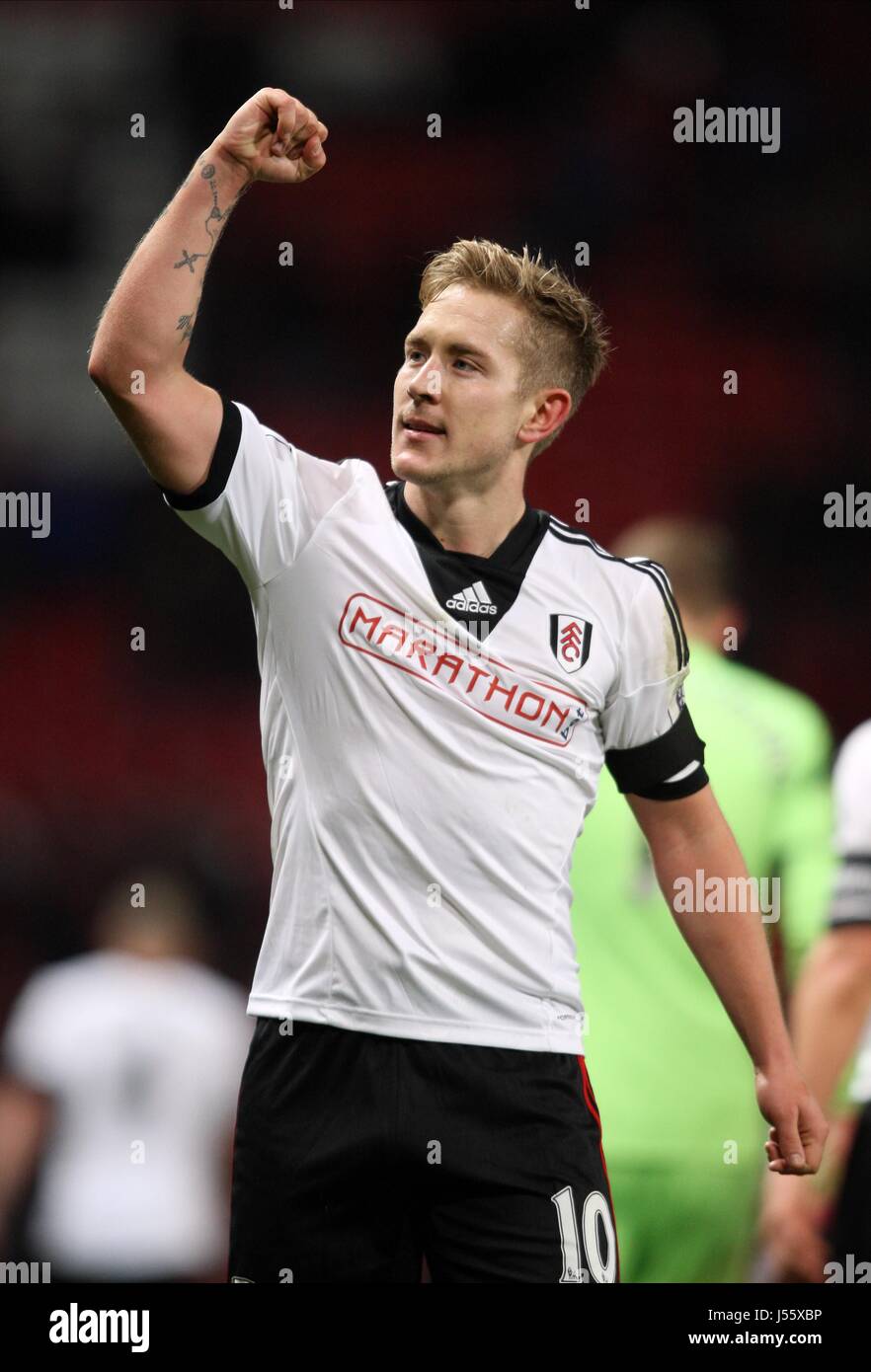 LEWIS HOLTBY CELEBRATES MANCHESTER UNITED V FULHAM OLD TRAFFORD MANCHESTER ENGLAND 09 February 2014 Stock Photo