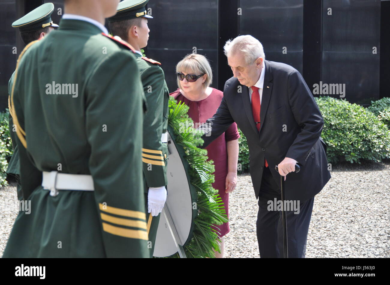 Nanking, China. 16th May, 2017. Czech President Milos Zeman (right) and his wife Ivana (second from right) laid on May 16, 2017 a wreath to the memorial to the victims of the massacre in which the Japanese army killed about 300,000 people in Nanjing, then China's capital city, in 1937. Zeman is one of the first world's statesmen who visited the Nanjing Massacre Memorial Hall. Credit: Karel Capek/CTK Photo/Alamy Live News Stock Photo