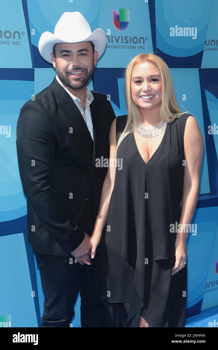 New York, NY, USA. 16th May, 2017. Rogelio Martinez and Lisa Marie Cordoba at Univision's 2017 Upfront Blue Carpet at the Lyric Theater on May 16, 2017 in New York City. Credit: Diego Corredor/Media Punch/17�Թ����� Live News Stock Photo
