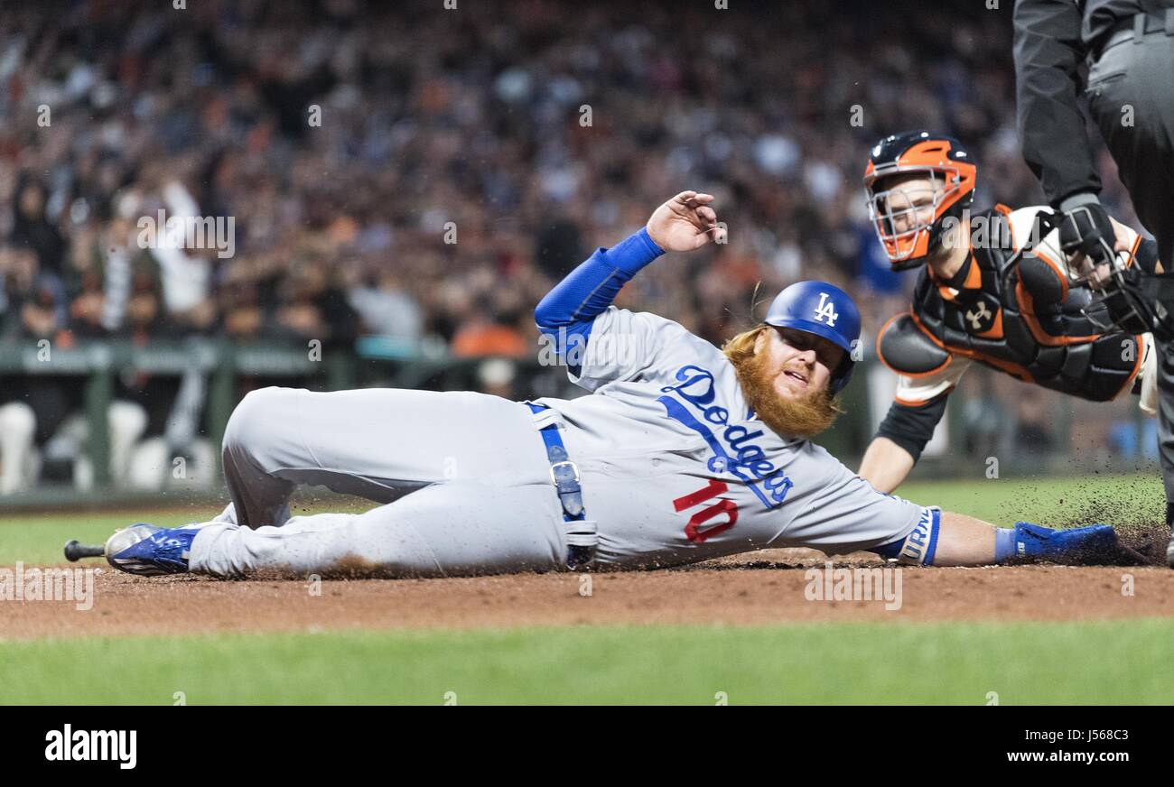 San Francisco, California, USA. 16th May, 2017. Los Angeles Dodgers third baseman Justin Turner (10) sliding past San Francisco Giants catcher Buster Posey (28), only to be tagged out in the third inning of a MLB baseball game between the Los Angeles Dodgers and the San Francisco Giants at AT&T Park in San Francisco, California. Valerie Shoaps/CSM/Alamy Live News Stock Photo