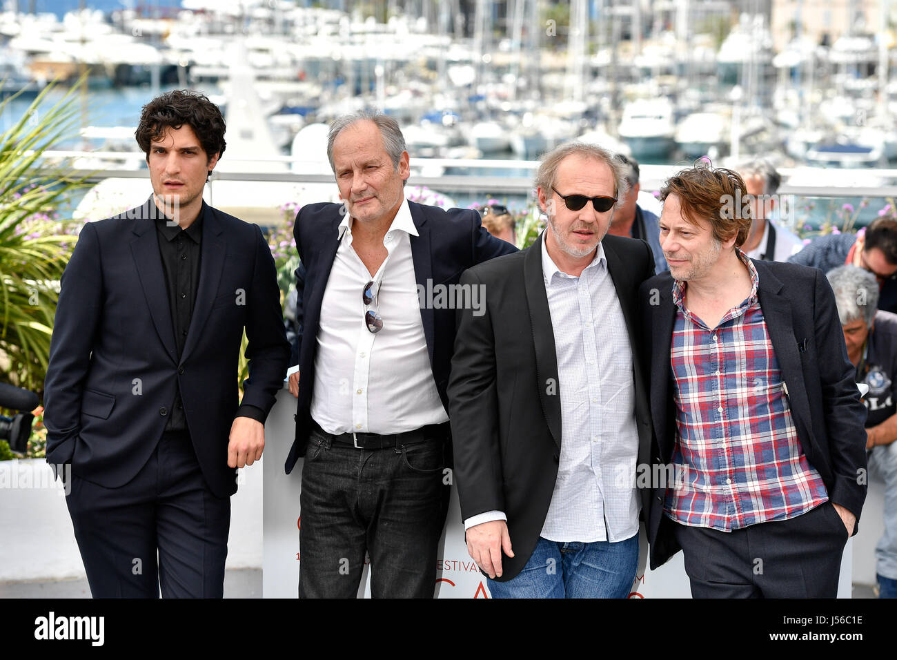 Actors Louis Garrel (1st L), Hippolyte Girardot (2nd L), Mathieu Amalric (1st R) and director Arnaud Desplechin (2nd R) of the film "Ismael's Ghosts" pose ...