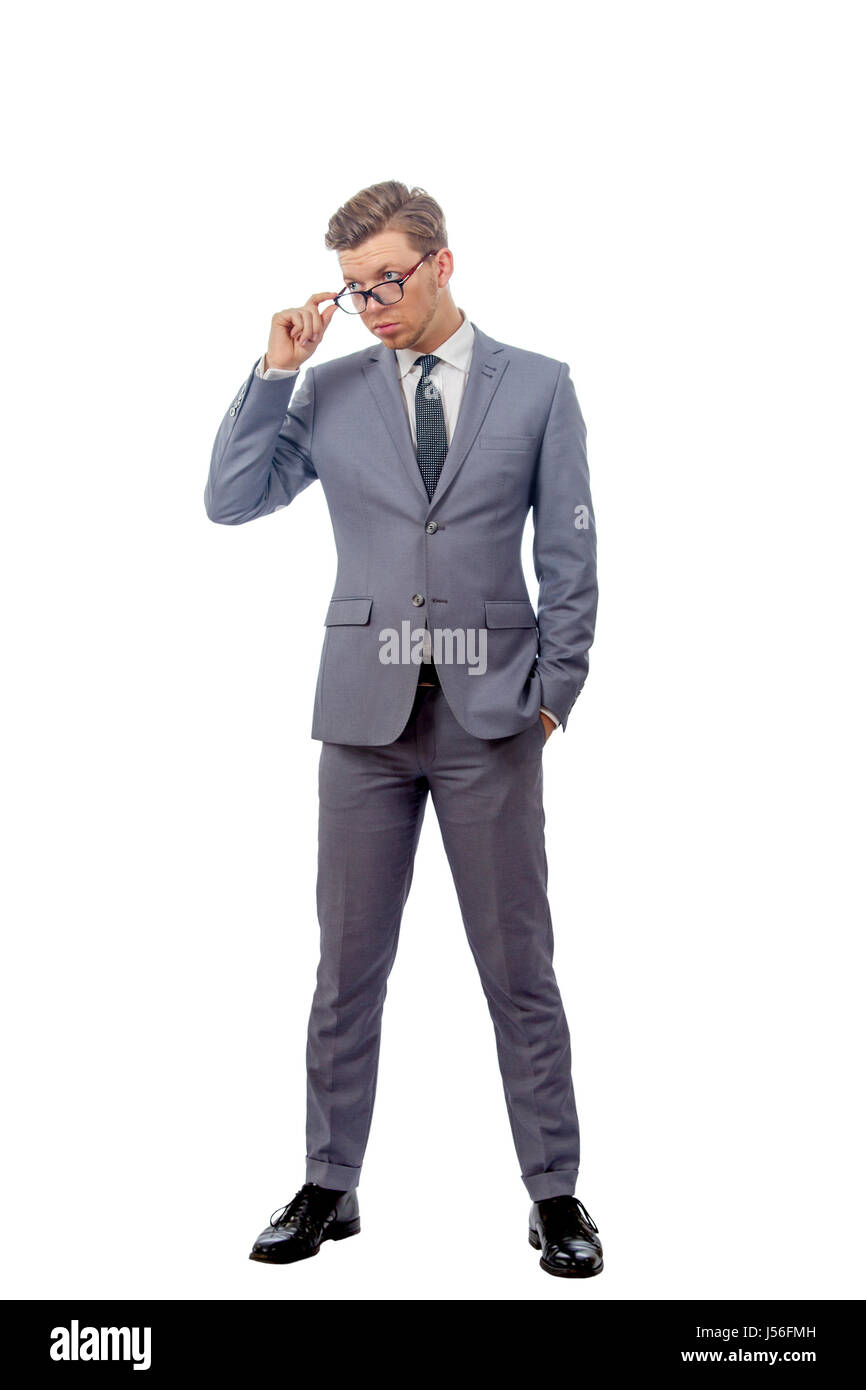 image of a young man in a business suit wearing glasses Stock Photo - Alamy