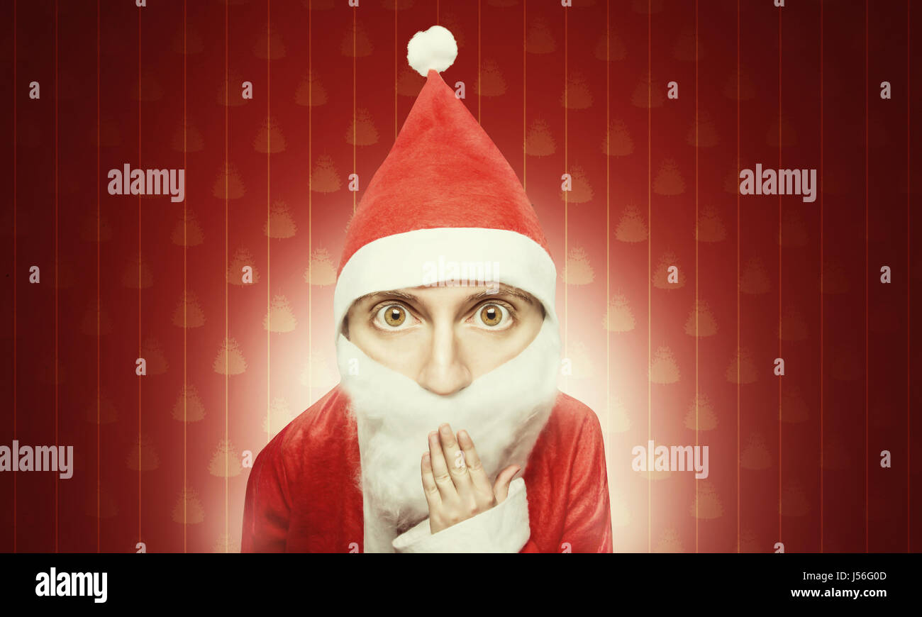 caricature of surprised santa claus comic figure with hand over mouth Stock Photo