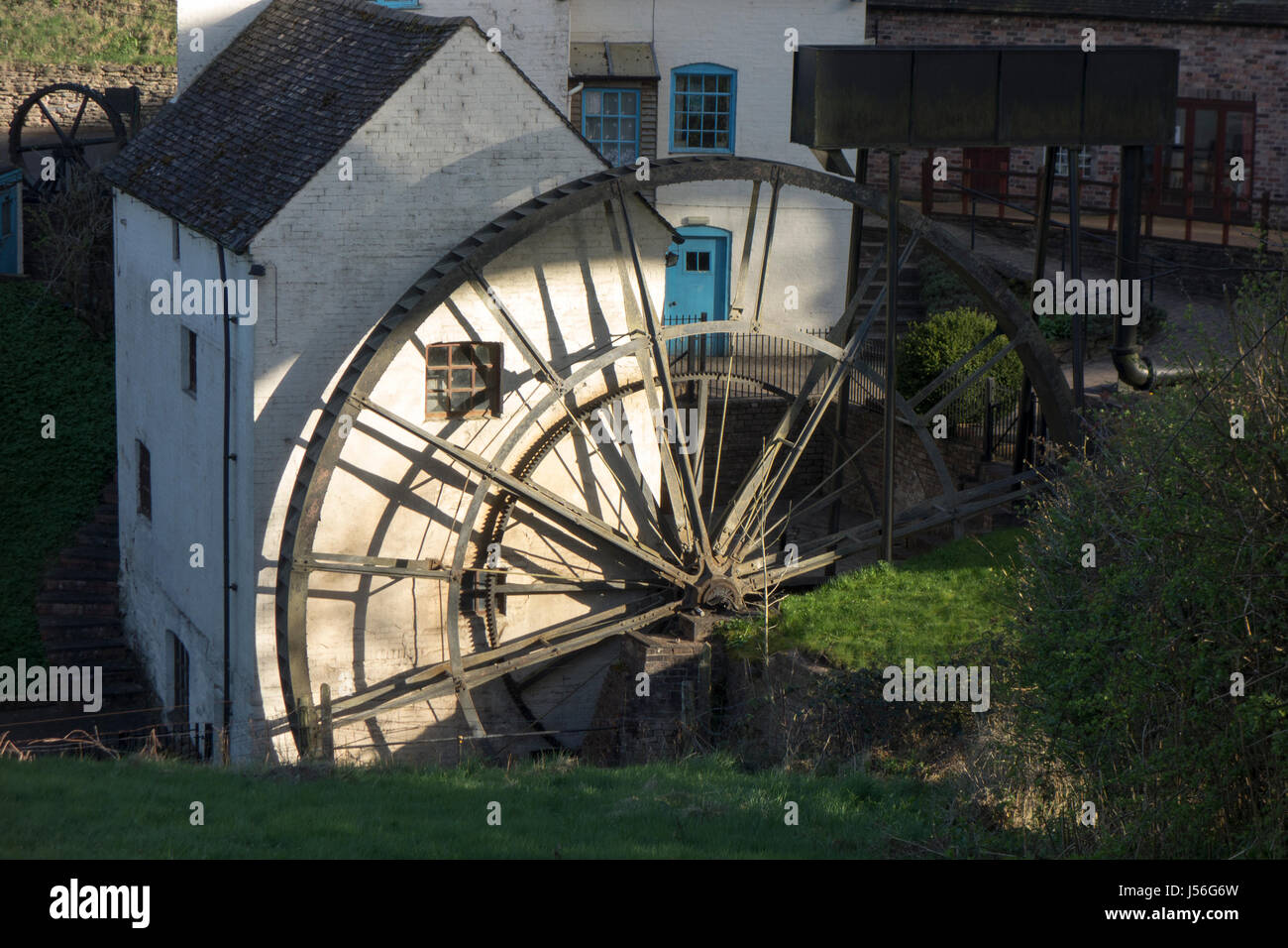 Daniels Mill is a working water mill used for milling flour, Bridgnorth Shropshire. The mill has the largest cast iron waterwheel in England UK Stock Photo