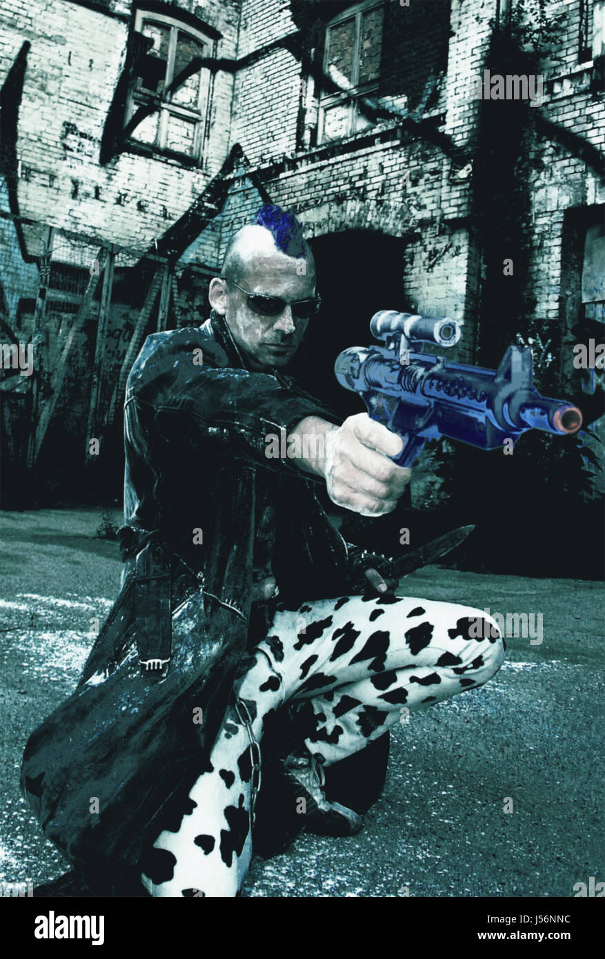 cool trash bad peccant wickedly evil gun firearm punk man mann iro sci-fi  Stock Photo - Alamy