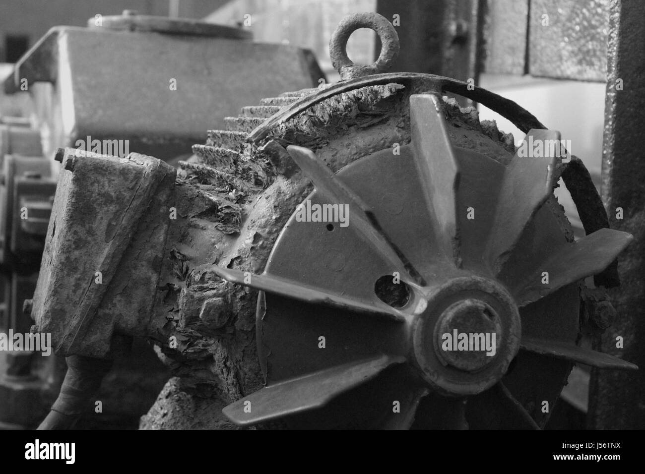 engine drive motor bw rusty end scrap tariff union goes to seed rust roast old Stock Photo