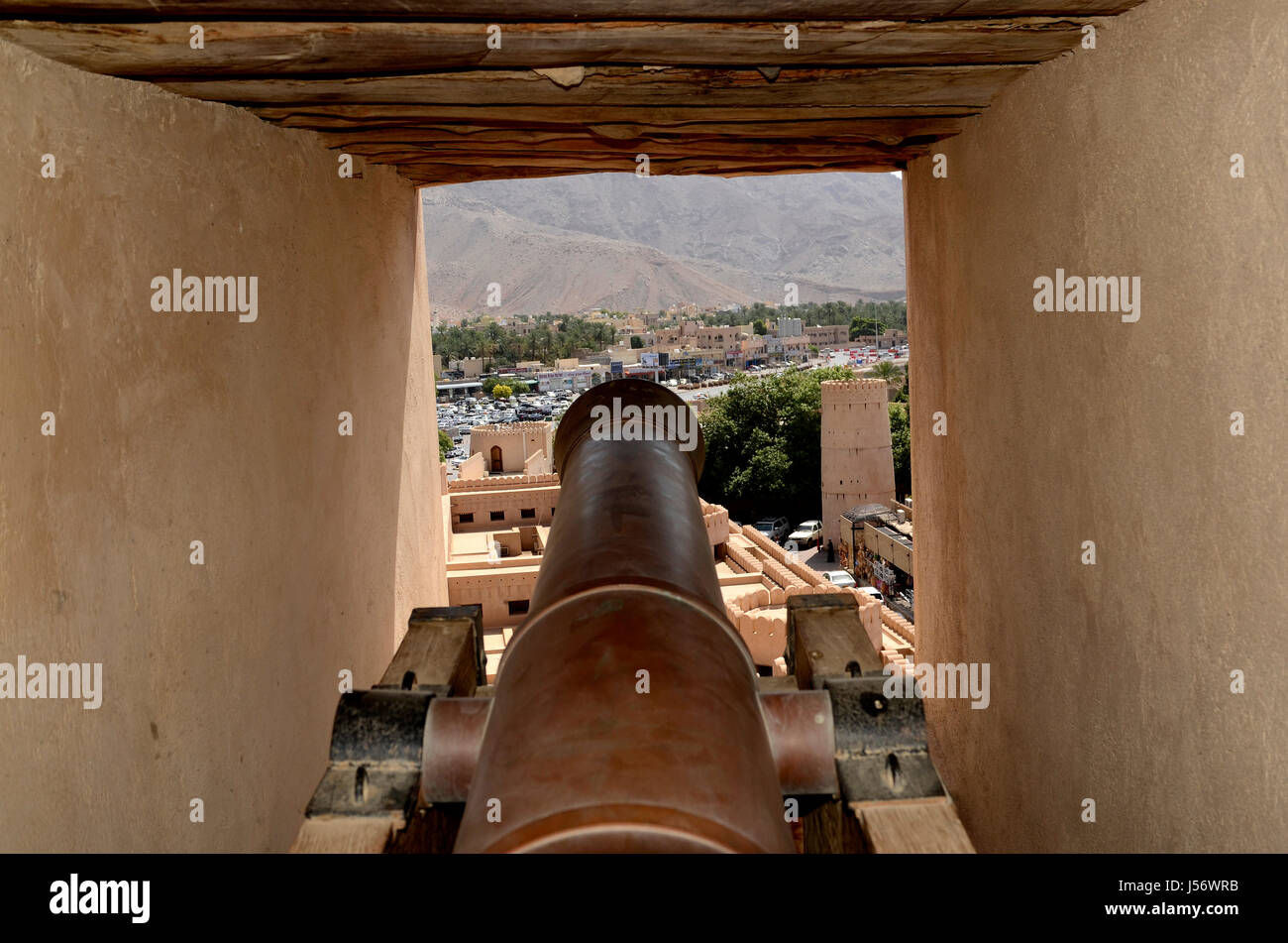 View through a canon window at Nizwa Fort, Nizwa, Sultanate of Oman Stock Photo
