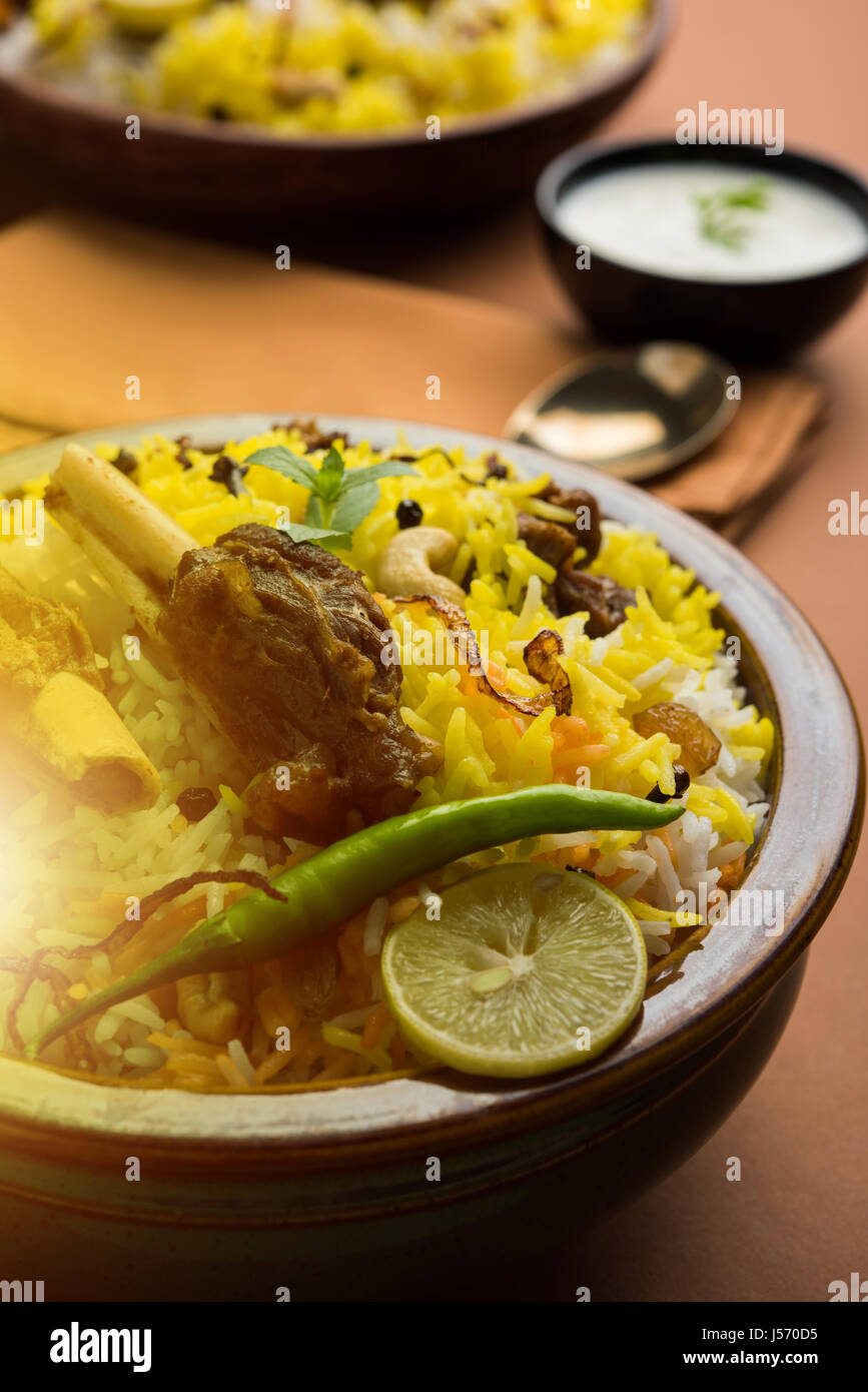 kashmiri Mutton Gosht Biryani / Lamb Biryani / Mutton Biryani served with Yogurt dip, selective