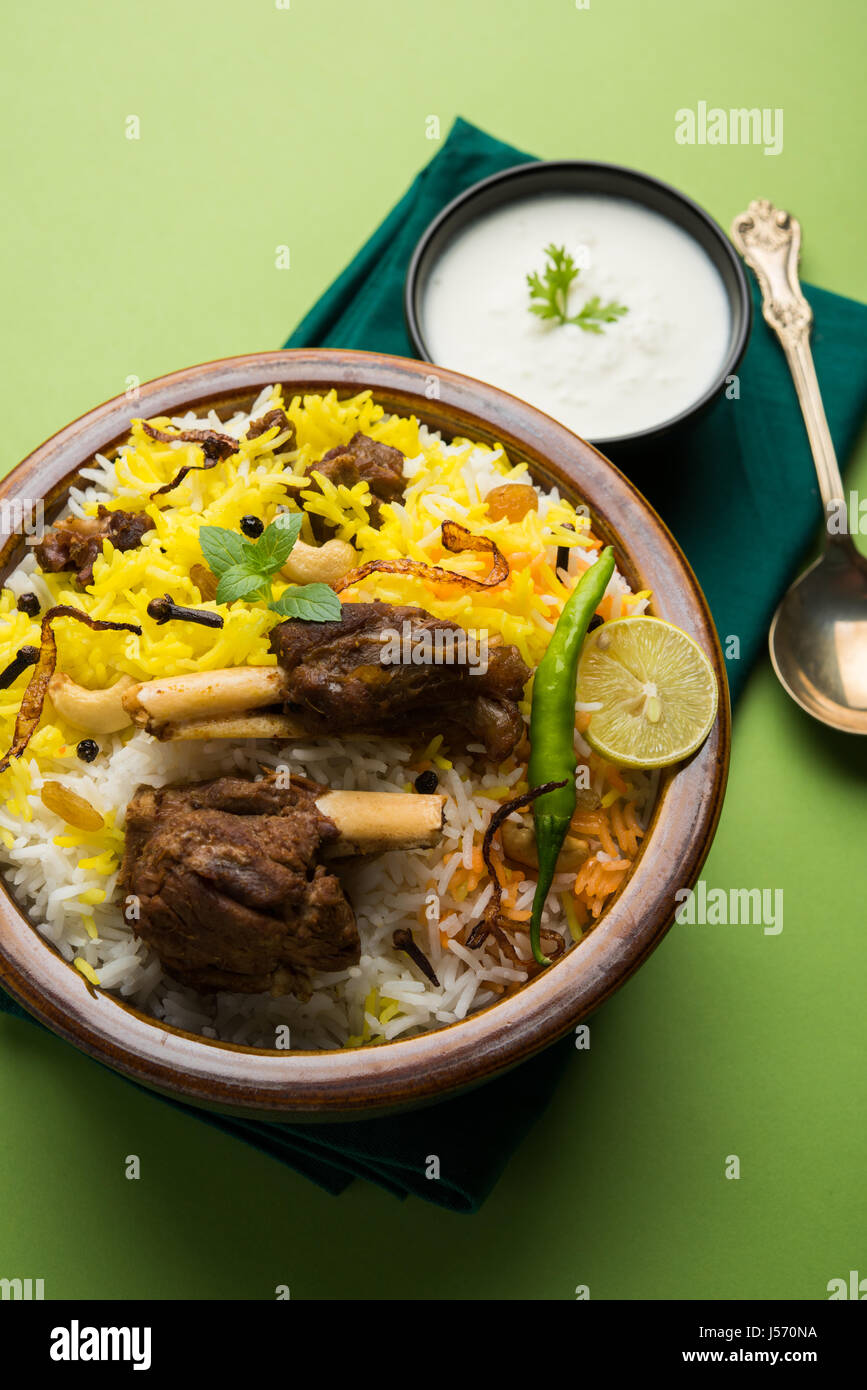 kashmiri Mutton Gosht Biryani / Lamb Biryani / Mutton Biryani served with Yogurt dip, selective
