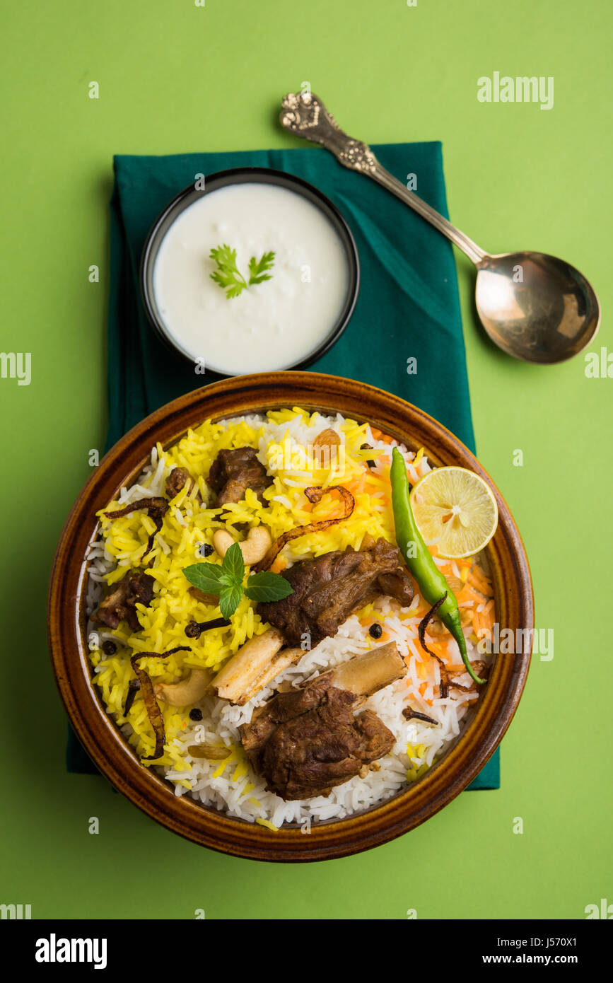 kashmiri Mutton Gosht Biryani / Lamb Biryani / Mutton Biryani served with Yogurt dip, selective