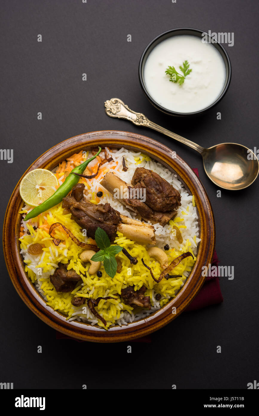 kashmiri Mutton Gosht Biryani / Lamb Biryani / Mutton Biryani served with Yogurt dip, selective