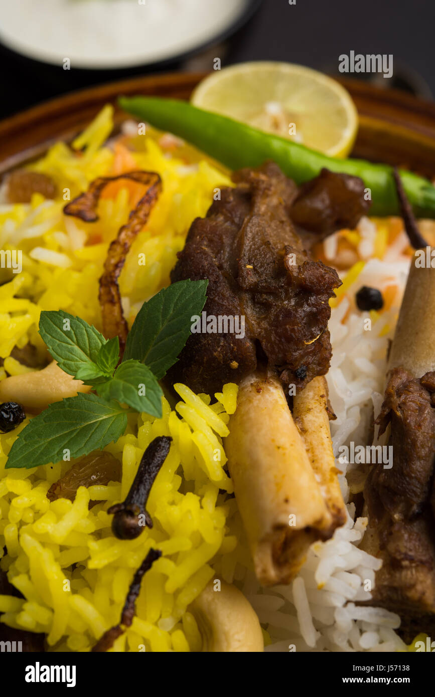 kashmiri Mutton Gosht Biryani / Lamb Biryani / Mutton Biryani served with Yogurt dip, selective