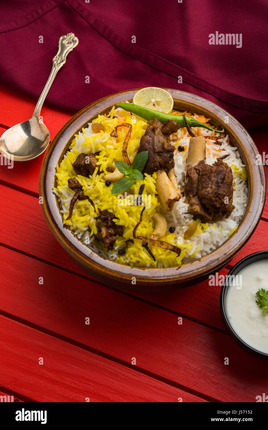 kashmiri Mutton Gosht Biryani / Lamb Biryani / Mutton Biryani served with Yogurt dip, selective