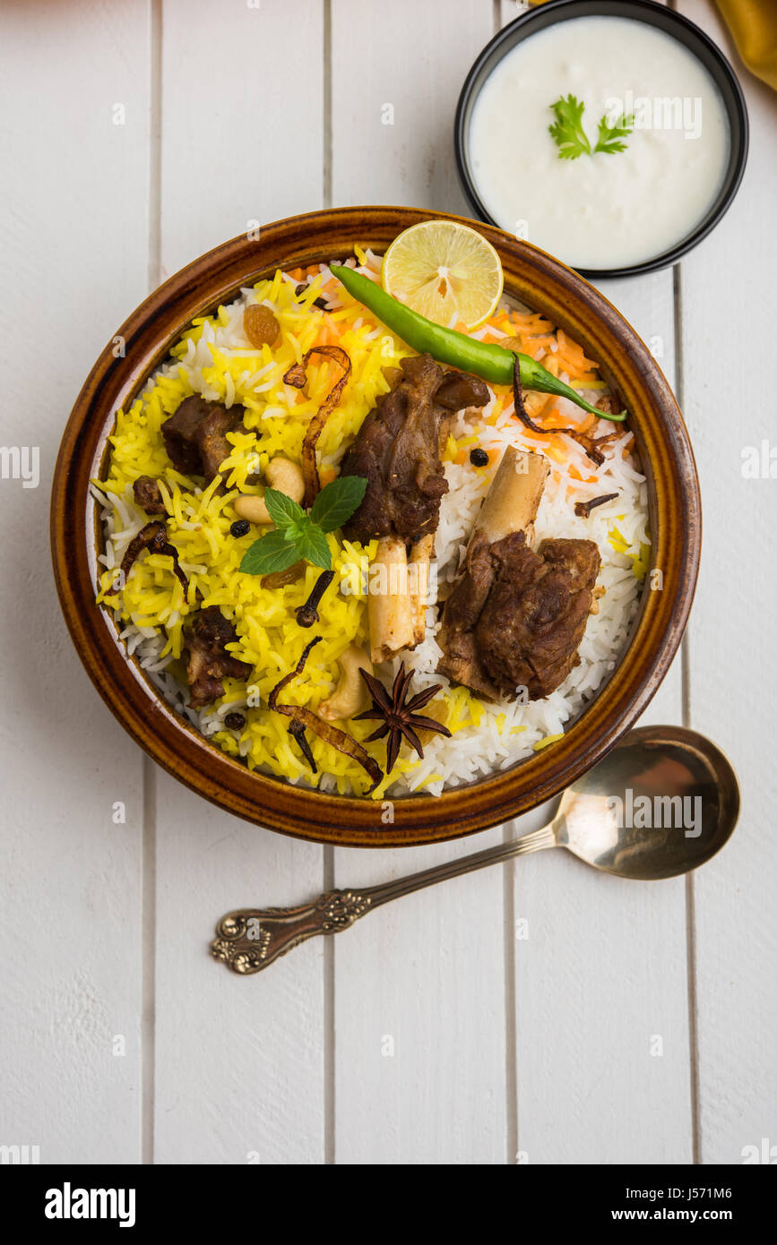 kashmiri Mutton Gosht Biryani / Lamb Biryani / Mutton Biryani served with Yogurt dip, selective