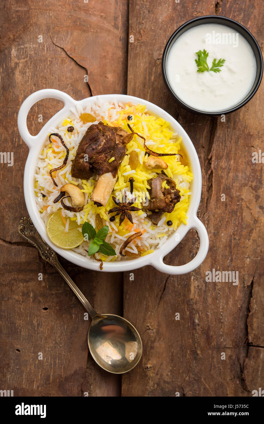 kashmiri Mutton Gosht Biryani / Lamb Biryani / Mutton Biryani served with Yogurt dip, selective