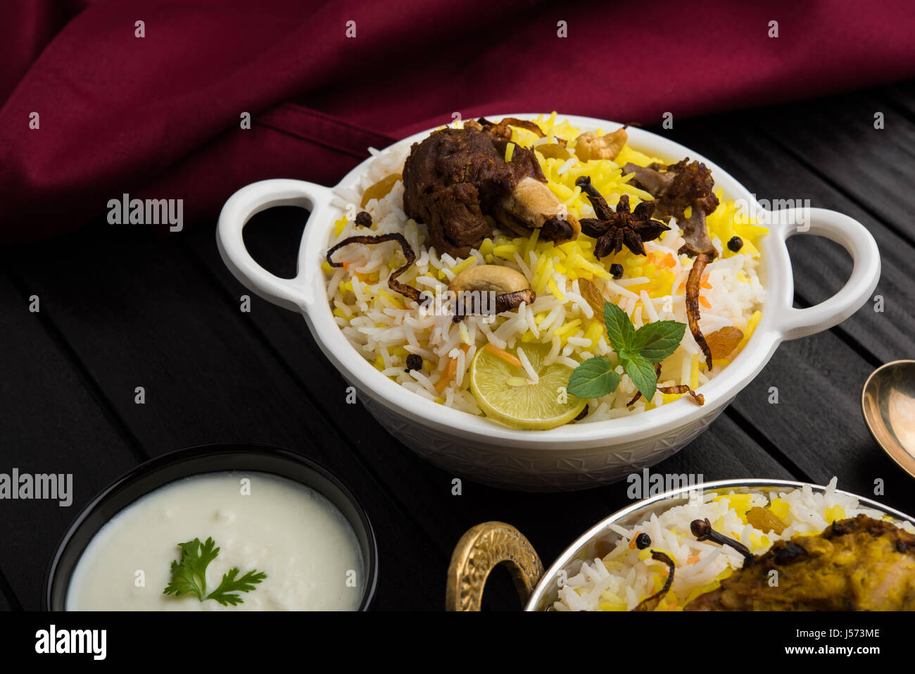 kashmiri Mutton Gosht Biryani / Lamb Biryani / Mutton Biryani served with Yogurt dip, selective
