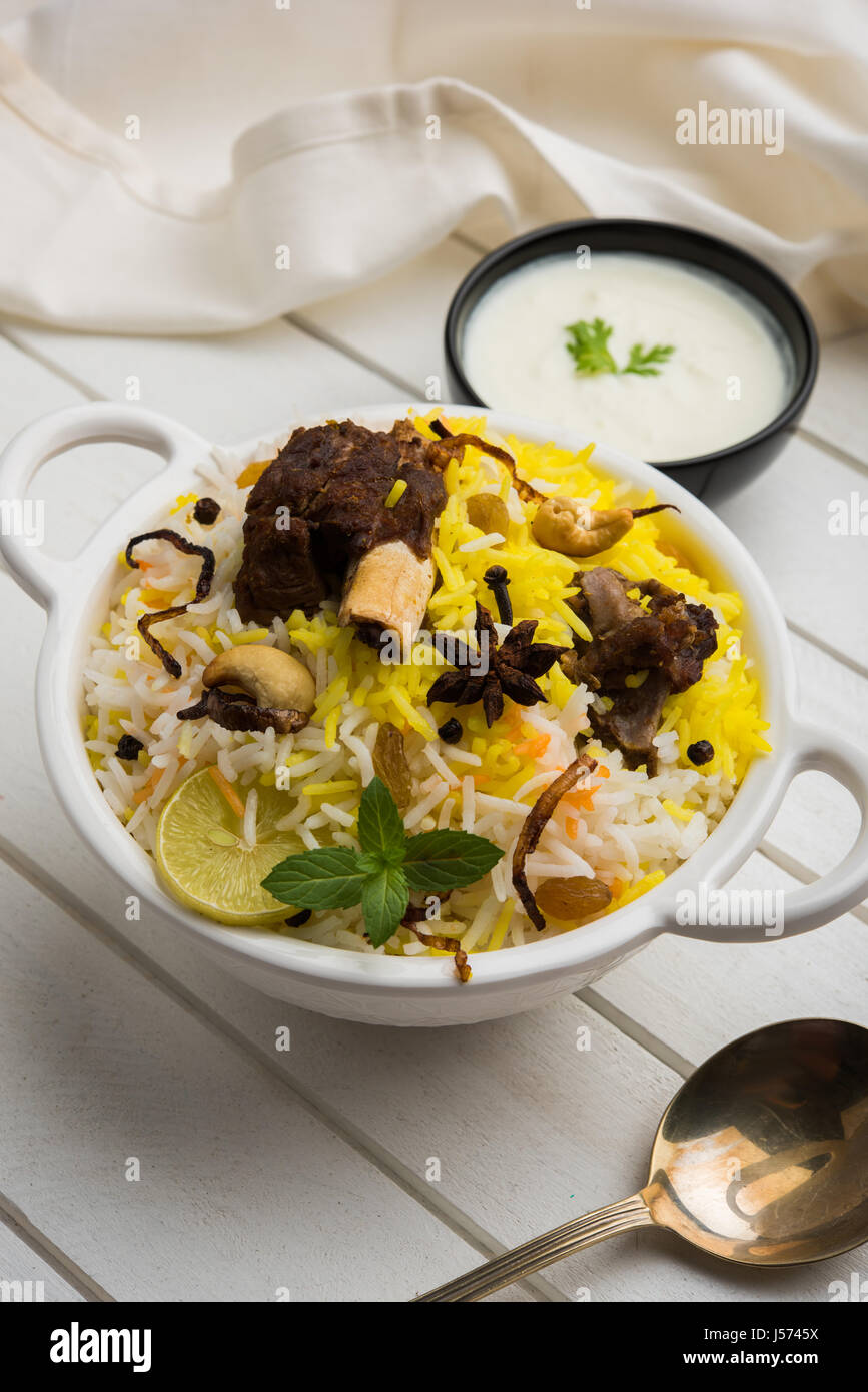 kashmiri Mutton Gosht Biryani / Lamb Biryani / Mutton Biryani served with Yogurt dip, selective