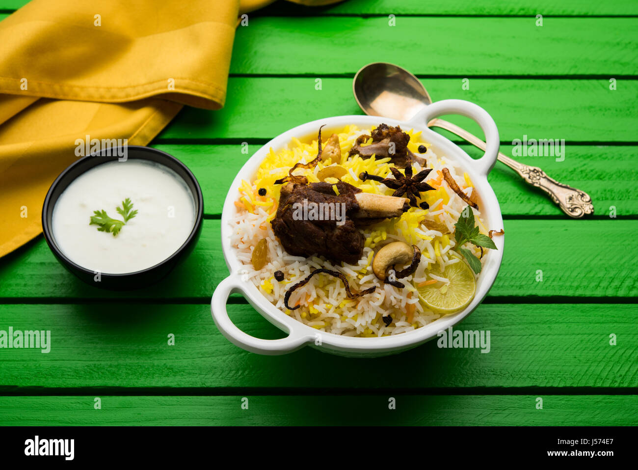 kashmiri Mutton Gosht Biryani / Lamb Biryani / Mutton Biryani served with Yogurt dip, selective