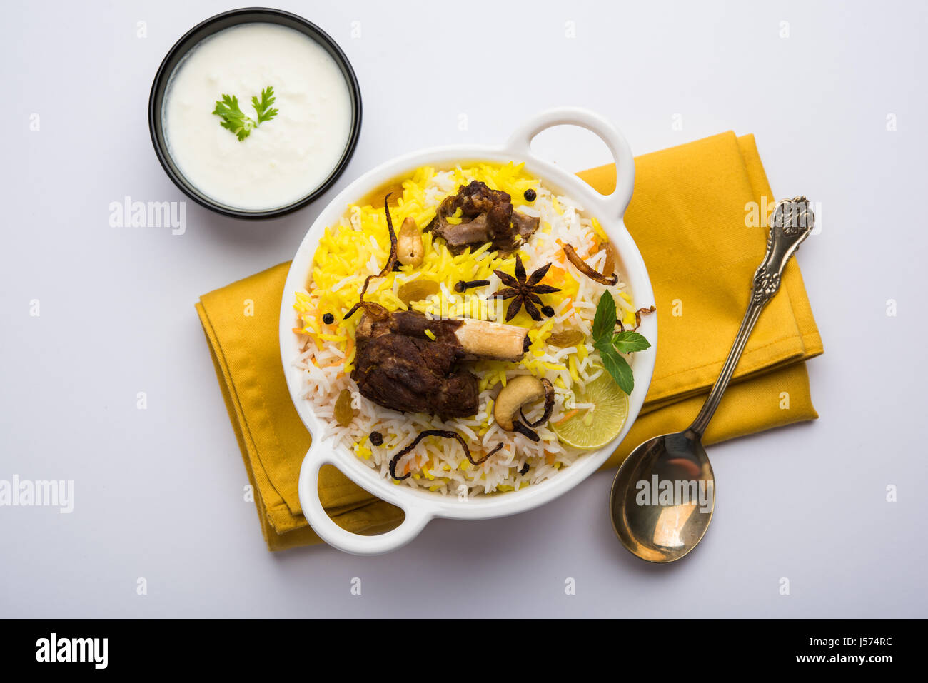 kashmiri Mutton Gosht Biryani / Lamb Biryani / Mutton Biryani served with Yogurt dip, selective