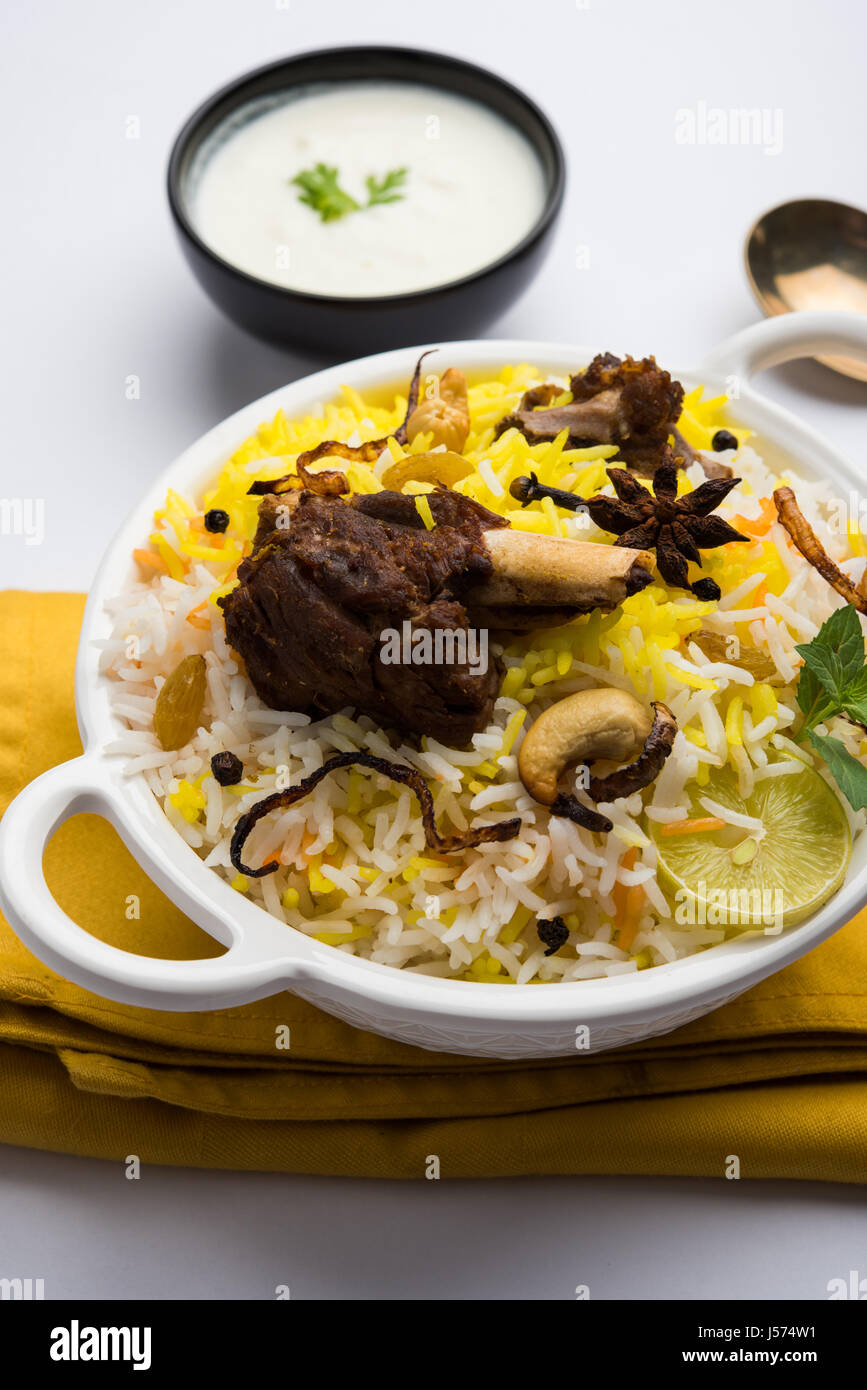 kashmiri Mutton Gosht Biryani / Lamb Biryani / Mutton Biryani served with Yogurt dip, selective